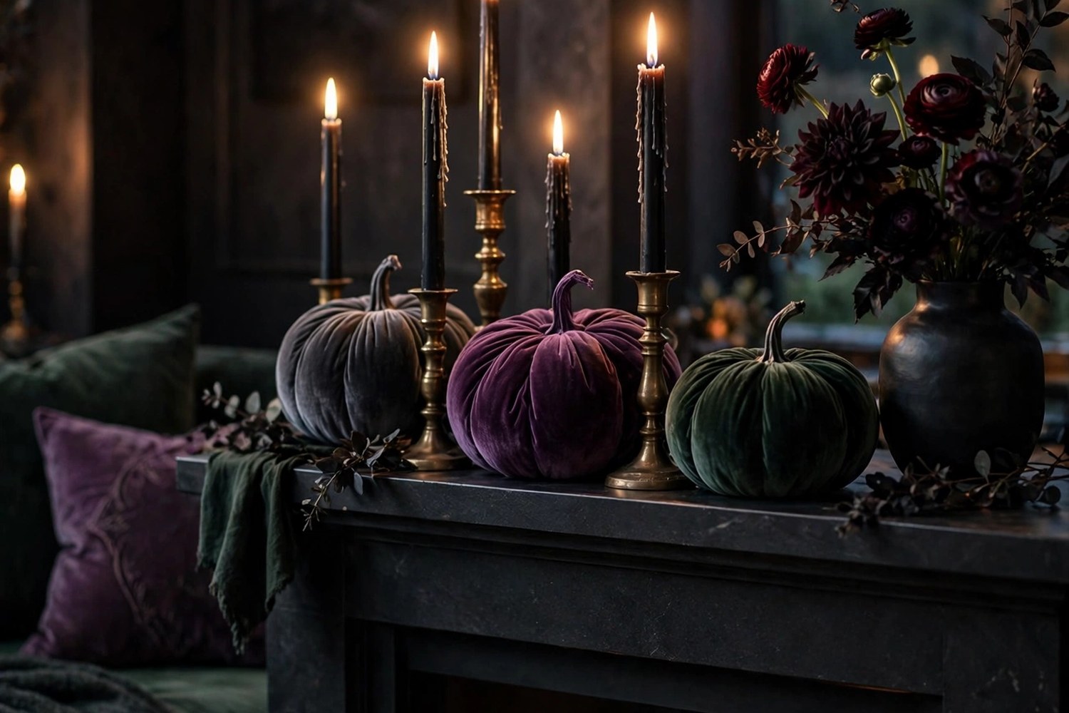 Elegant Halloween living room with velvet pumpkins, black taper candles in brass holders, and dark florals